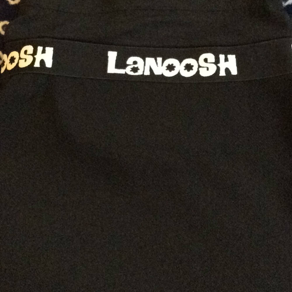 Lanoosh black skirt with neon yellow fanny pack